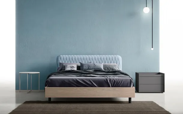 Letto Wing con testiera in tessuto trapuntato di Zalf