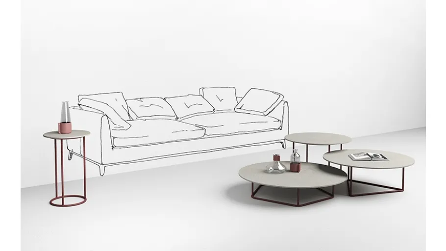 Tavolini con top in cemento bianco Circus di Minotti Italia