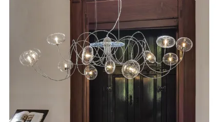 Lampada a sospensione con bracci cromati e paralumi in cristallo Oktopus di Cattelan Italia