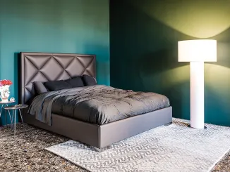 Letto contenitore in ecopelle con testiera lavorata a rombi Patrick di Cattelan Italia