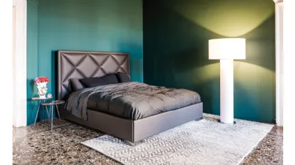 Letto contenitore in ecopelle con testiera lavorata a rombi Patrick di Cattelan Italia