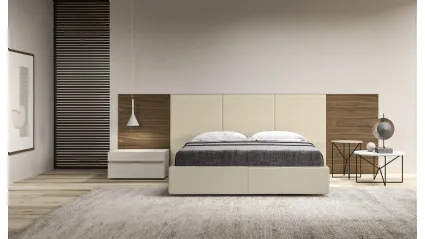 Letto con testiera composta di pannelli boiserie in essenza imbottiti in ecopelle Folio di Presotto
