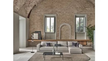 Divano in ecopelle con penisola Pitagora di Bontempi