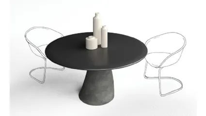 Tavolo tondo Malone con top in laccato Nero e base in cemento di Minotti Italia