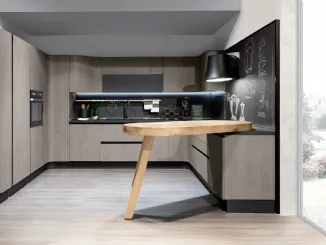 Cucina Design angolare con penisola Penelope in natural Ash con piano snack in ulivo massello di Aran