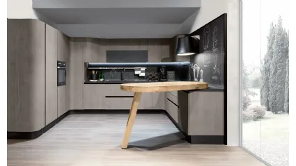 Cucina Design angolare con penisola Penelope in natural Ash con piano snack in ulivo massello di Aran